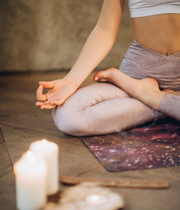 Woman in a calm yoga pose, embodying harmony and balance.